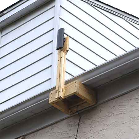 install hdtv antenna outside above the roof-line